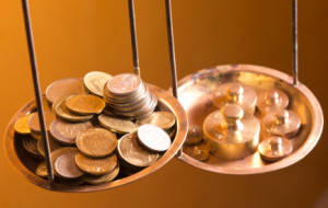 coins on a scale weight